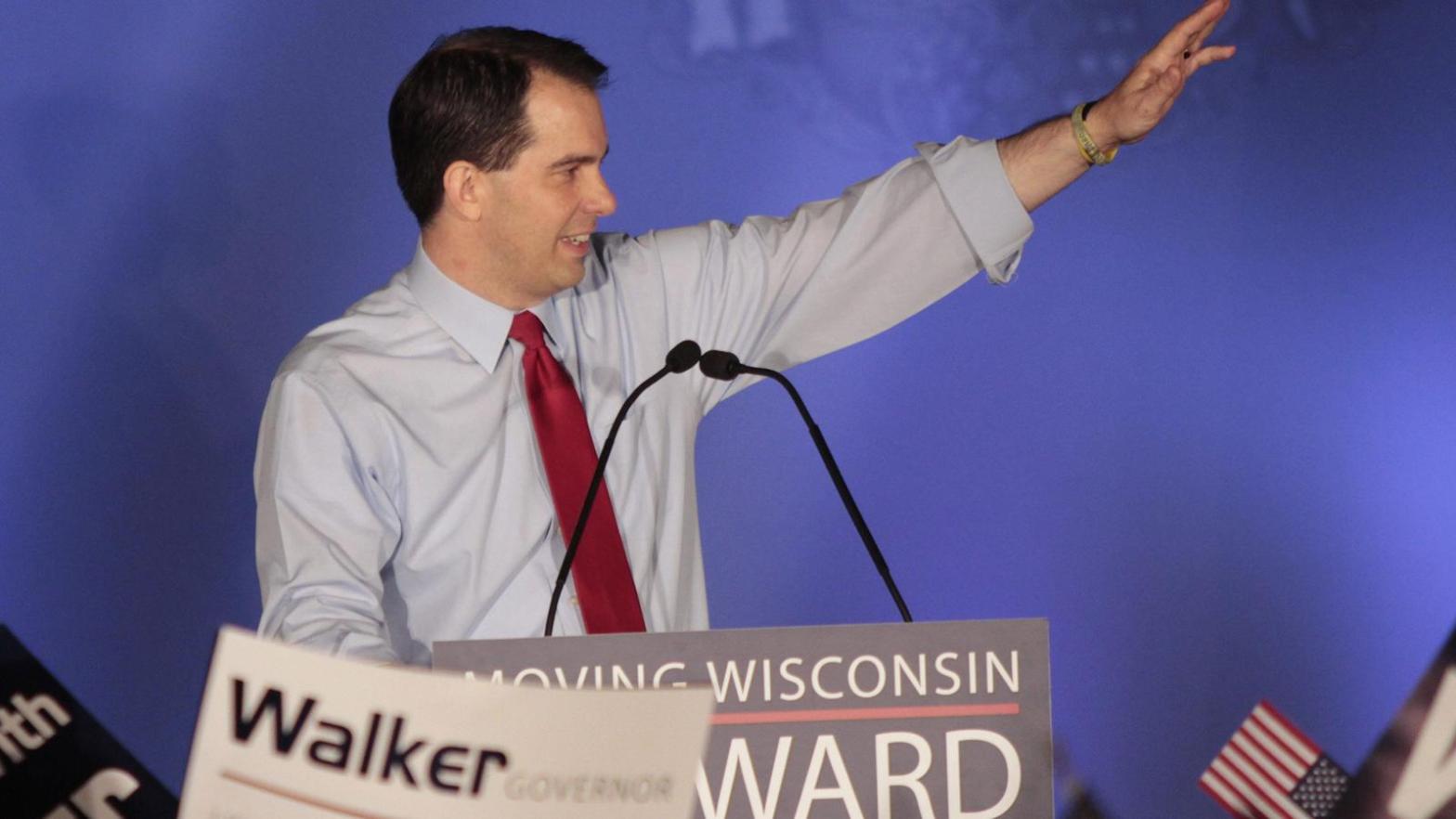 Republican Wisconsin Governor Walker celebrates his victory in the recall election against Democratic challenger and Milwaukee Mayor Barrett in Waukesha, Wisconsin